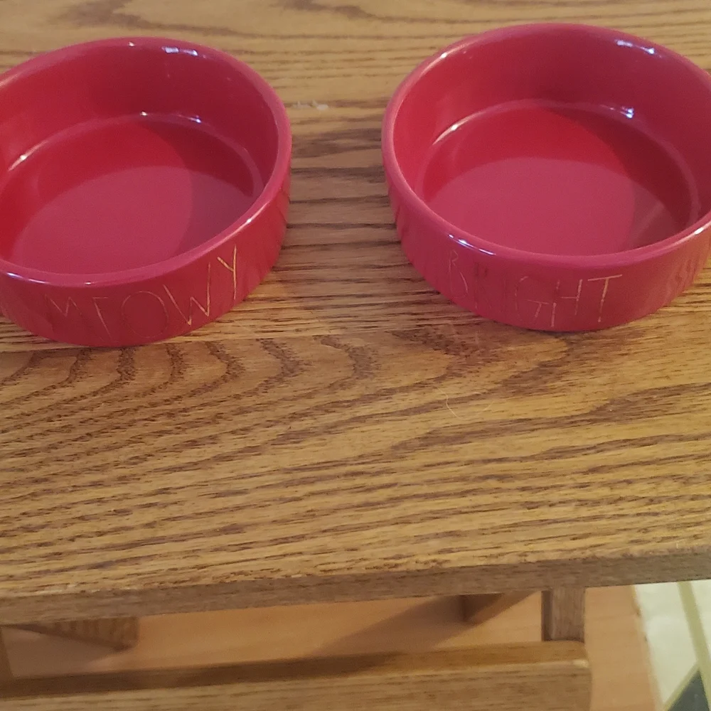Rae Dunn meowy and bright red pet dishes